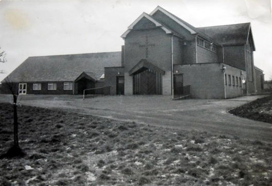 St Francis Church and 'the 'the old black hut' used as a community hall