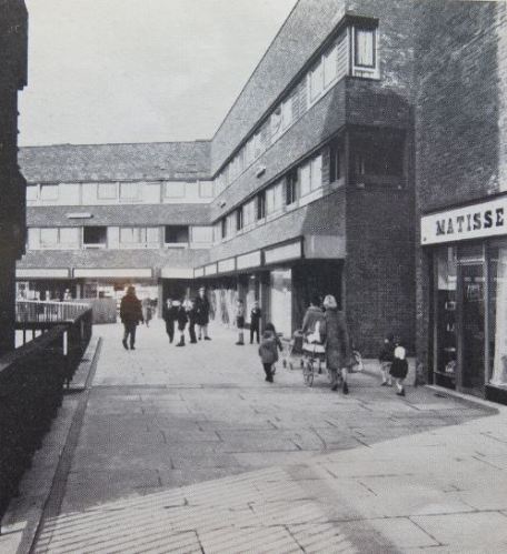 From the GLC Brochure: the elevated shopping centre since replaced with a smaller ground-level terrace